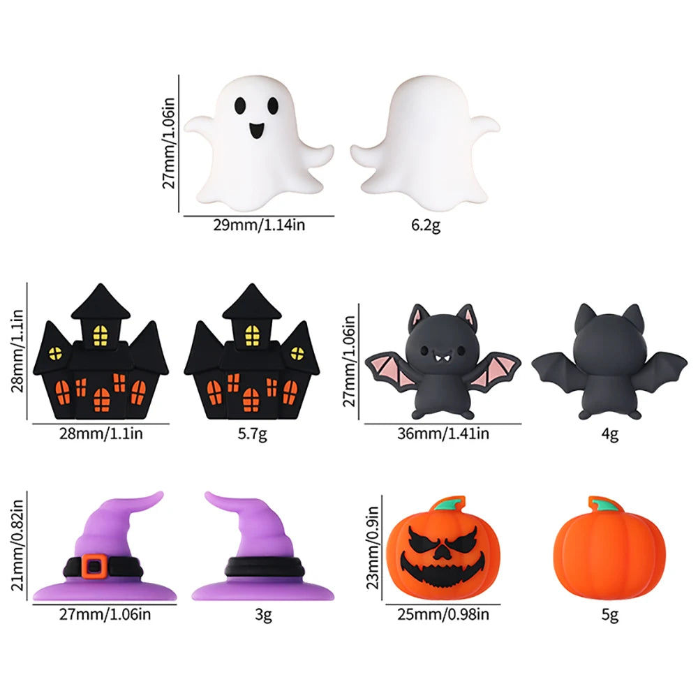 A collection of Halloween silicone beads including white ghost, black bat, and orange pumpkin shapes for jewelry making