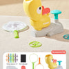 A yellow duck-shaped foot launcher toy with an attached flying disc and catching nets and accessories.