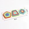 A wooden shape and color sorter puzzle for toddlers featuring five colorful geometric shapes on a light wooden board.