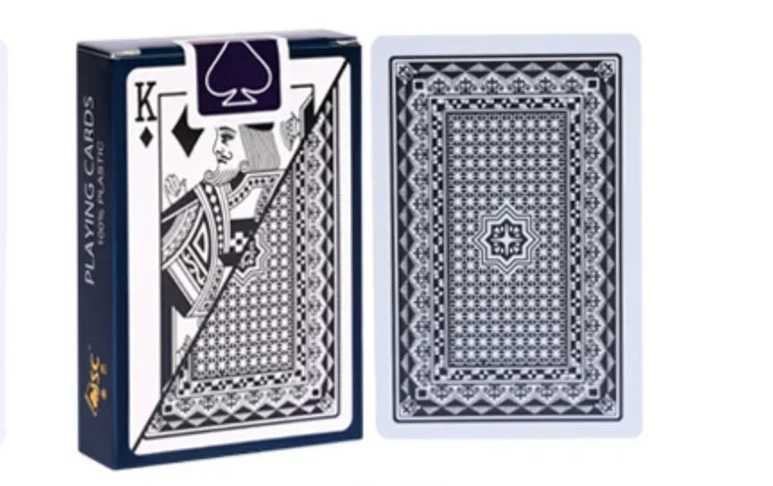 A box of playing cards featuring a King design and a traditional paisley pattern.