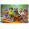 A group of five people and a dog are paddling an orange canoe on water.