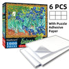 Box of a 1000-piece Iris jigsaw puzzle with adhesive paper and six puzzle pieces
