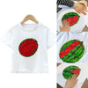 White t-shirt featuring a red and green sequin watermelon design on the chest.
