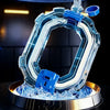 A clear blue electric water blaster toy gun is shown with water spraying from it, demonstrating its maximum water capacity.