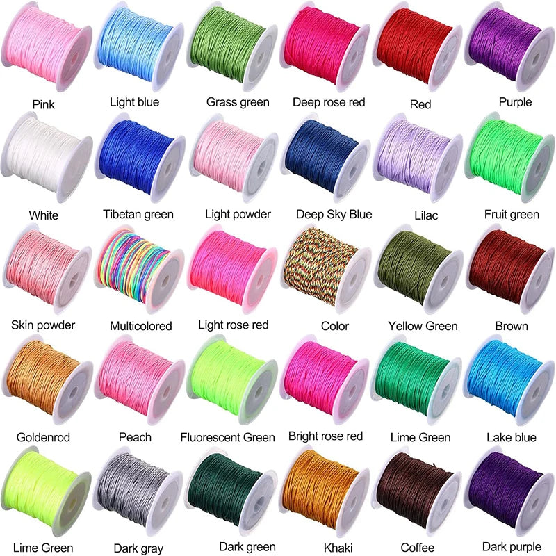 A variety of colored nylon knotting cords for jewelry making, including pink, green, red, purple, and yellow shades.
