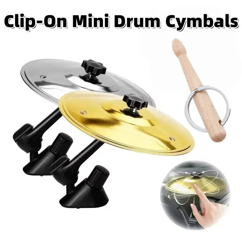 A set of clip-on mini drum cymbals including a brass and silver cymbal and a wooden mallet.