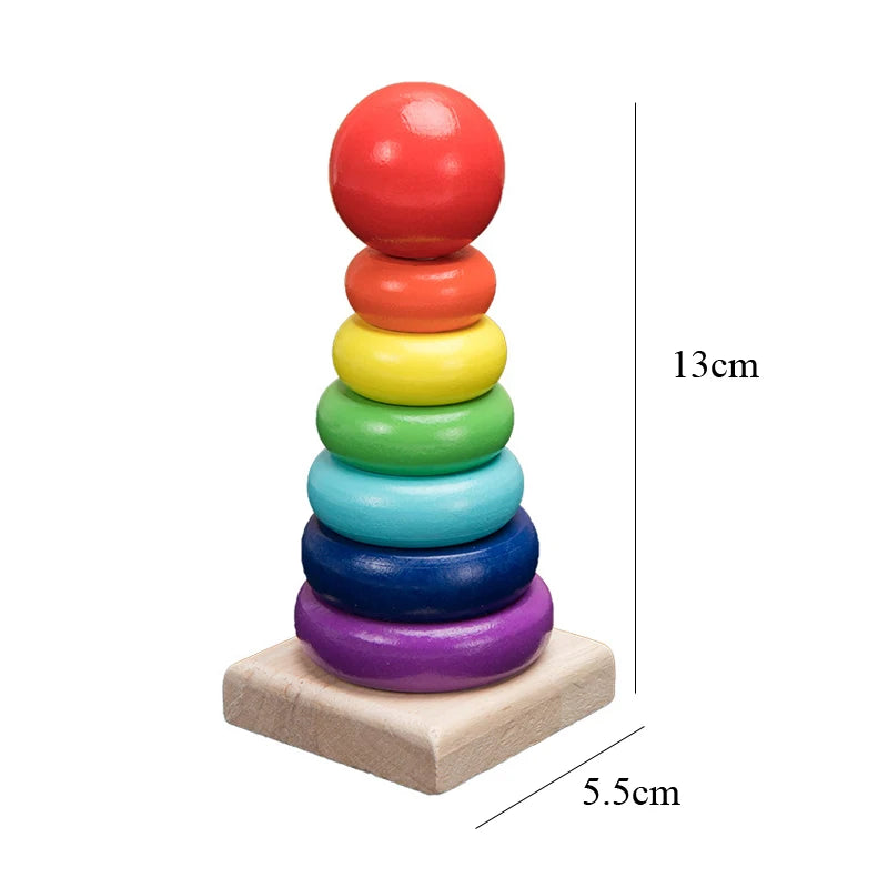 A stack of colorful wooden sensory blocks in rainbow order, resting on a light wooden base.