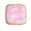 A square resin palette with pink marbled resin and a gold trim.