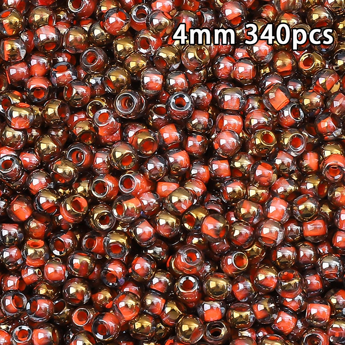 A close-up view of 340 golden gradient glass beads in various shades of amber and reddish-brown.