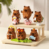 A set of cute capybara micro building blocks featuring several brown and pink animal figures.