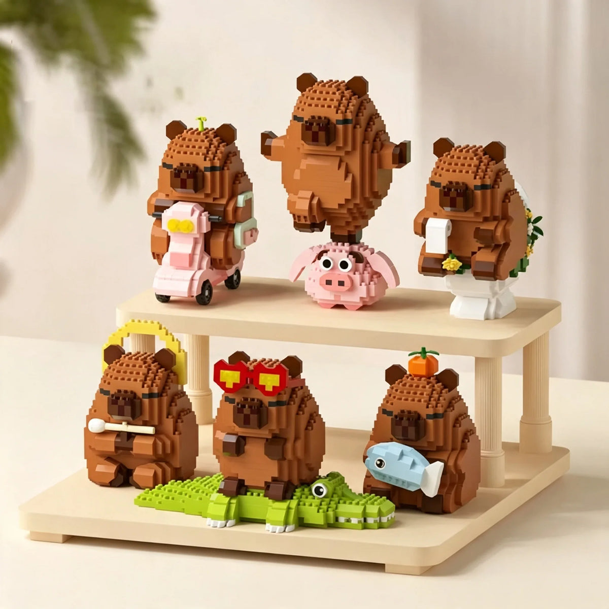 A set of cute capybara micro building blocks featuring several brown and pink animal figures.