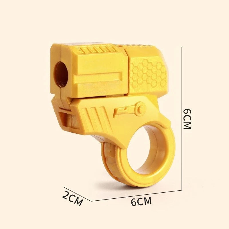 A yellow mini shell-ejecting fidget pistol for stress relief, shown with dimensions.