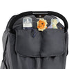 A gray waterproof stroller cover with a black handle shows several stuffed animals inside.