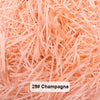 Close-up of light pink raffia paper shreds used for gift boxes and baskets.