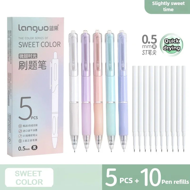 A set of five colored 0.5mm quick-drying gel pens in various shades of pink and blue.