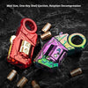 A close-up photo of a red and purple metal gun-shaped fidget toy with brass components on a dark surface.