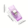 A plastic diamond painting clip in purple with a silver square piece, shown from the side.