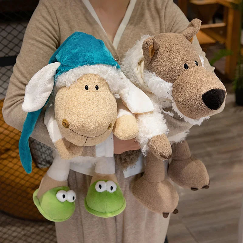A soft plush toy of a sheep wearing a blue hat and a wolf head, held by a person.