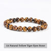 A bracelet made of natural yellow tiger eyes stone beads.