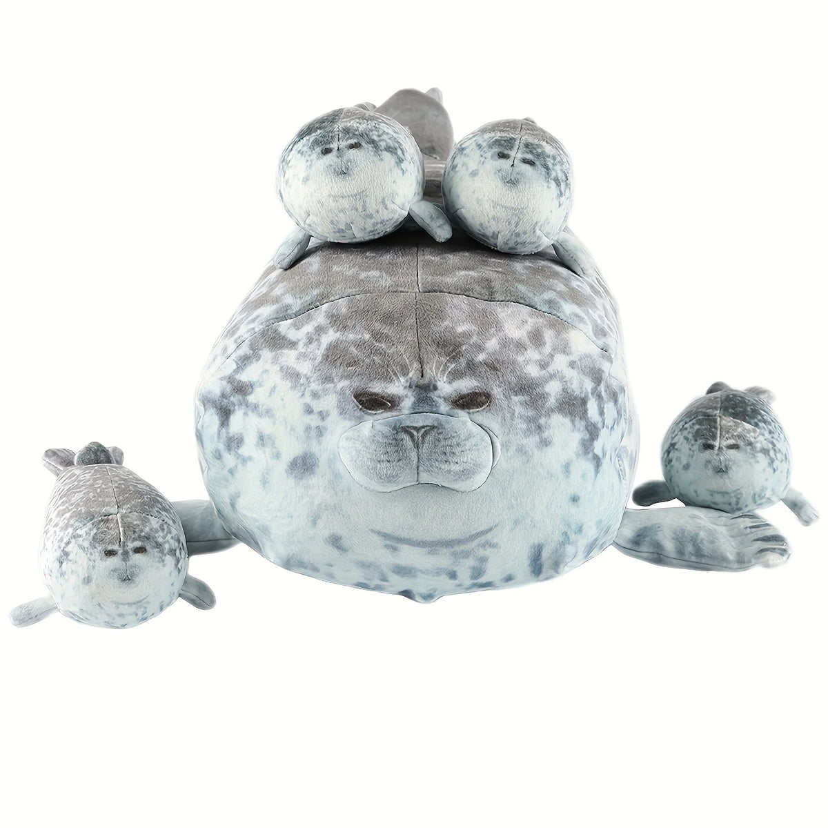 A plush seal family pillow featuring a large adult seal and four baby seals.