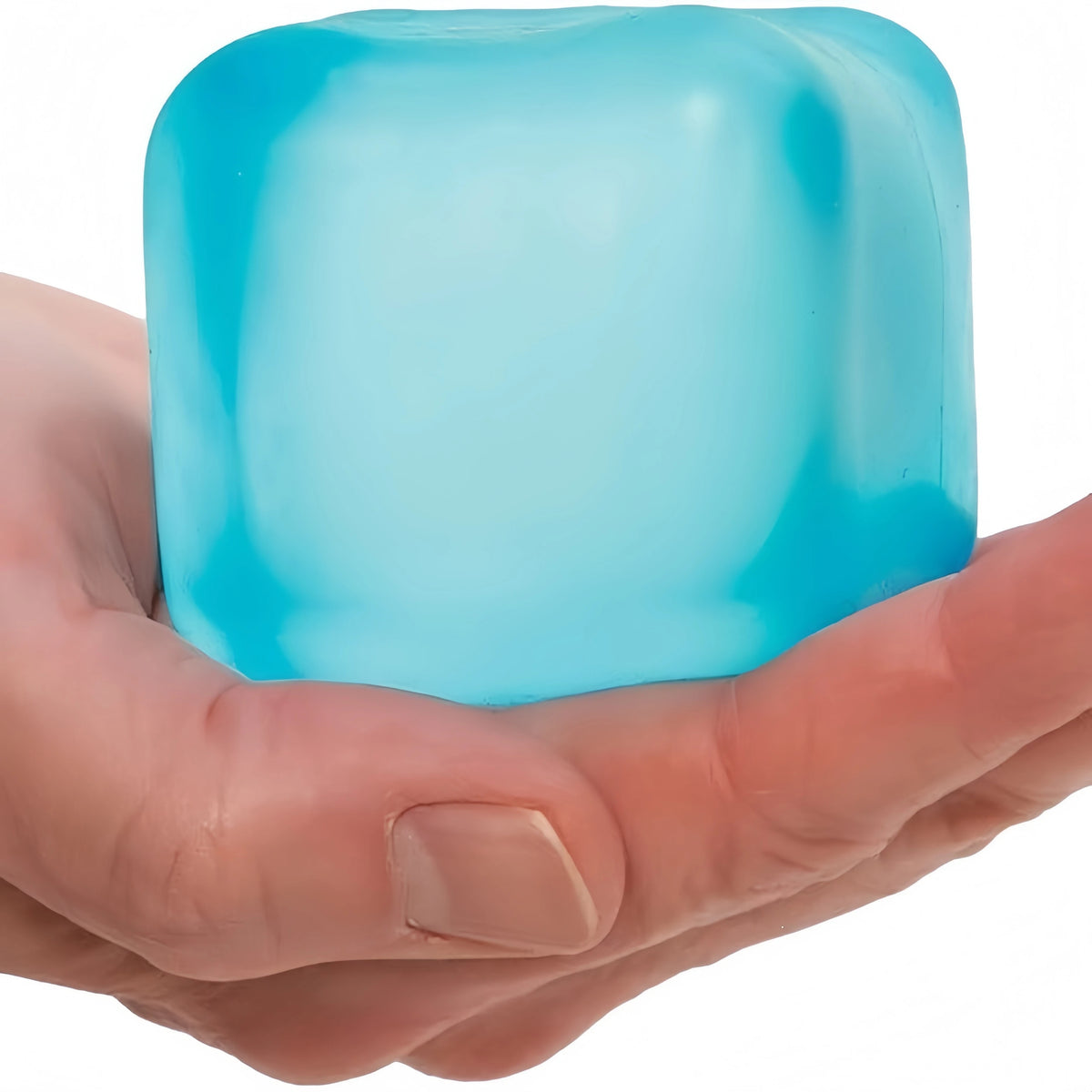 A hand holds a translucent blue slow-rebound ice cube squishy stress toy.
