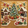 A diamond painting depicts a festive Christmas scene with a decorated tree, houses, and snowmen.