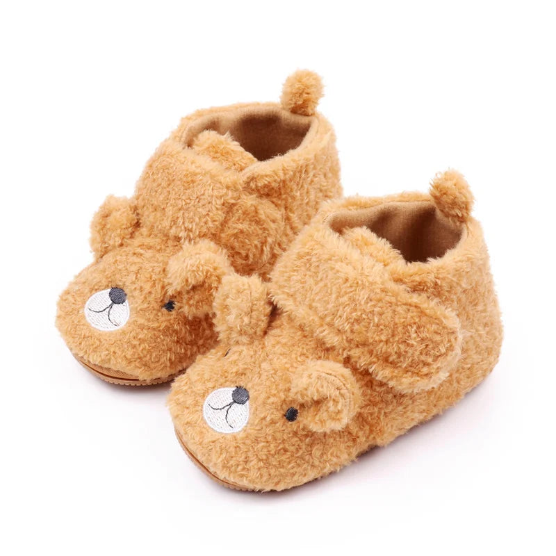 Pair of cute bear design baby prewalker shoes made of soft brown faux fur.