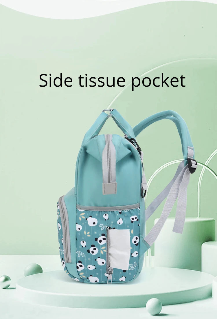 A teal backpack featuring a side tissue pocket, designed for wet/dry separation and large capacity.