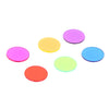 A collection of six colorful plastic bingo chips in shades of pink, yellow, purple, blue, green, and orange.