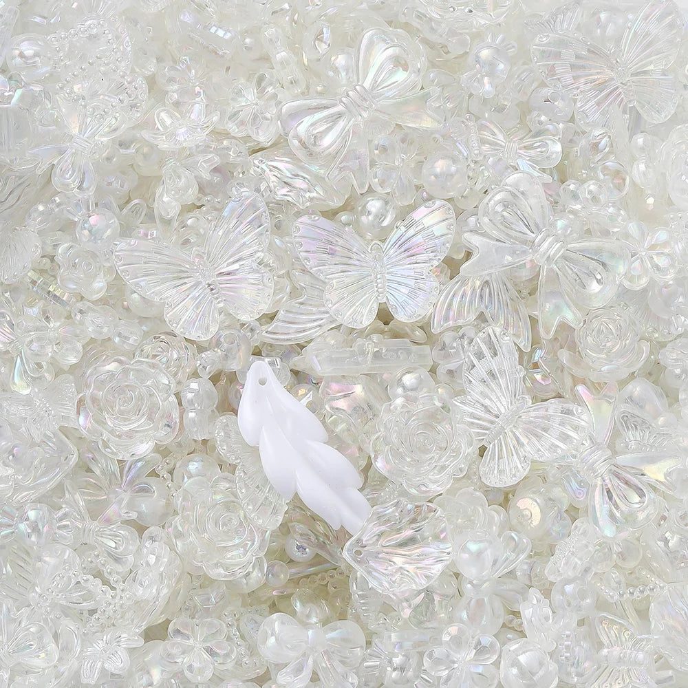 Clear acrylic butterfly shells and small floral beads for DIY jewelry making