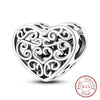 A sterling silver heart charm bead with intricate scrollwork design.