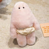 A soft pink Kawaii monster plush doll with a belly and pants is shown on a light-colored carpet.
