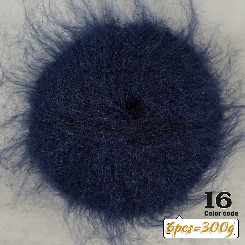 A dark navy blue ball of long-haired alpaca blend yarn labeled as 16 color code, with a weight indication of 6 pieces equal t