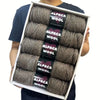 A pack of five gray alpaca wool yarn skeins for knitting and crochet.