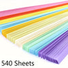 A fan of colorful paper strips in various shades including pink, orange, yellow, green, and purple.