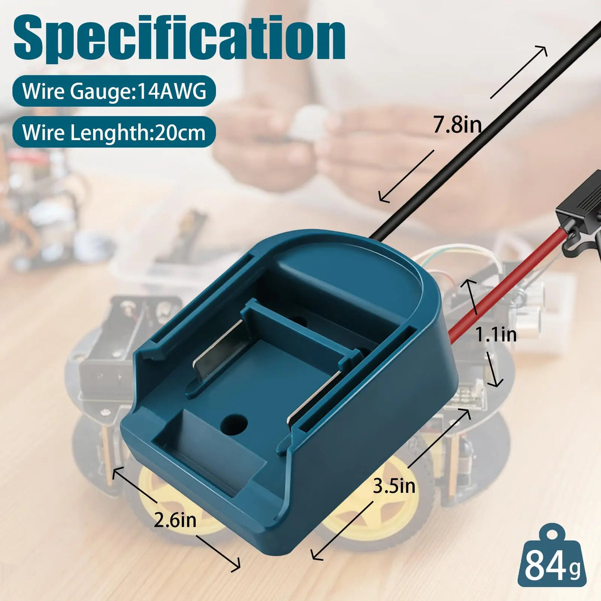 A blue wire adapter with a switch and fuse is shown next to a Makita battery, measuring 84g.