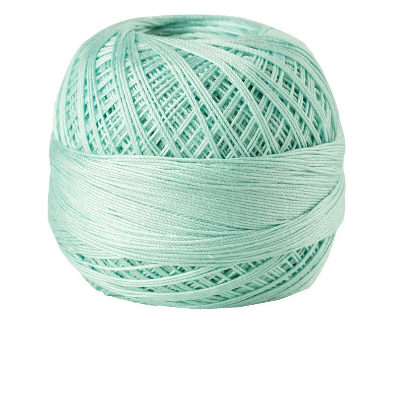 A ball of light mint green 100% cotton crochet thread for tatting and embroidery.
