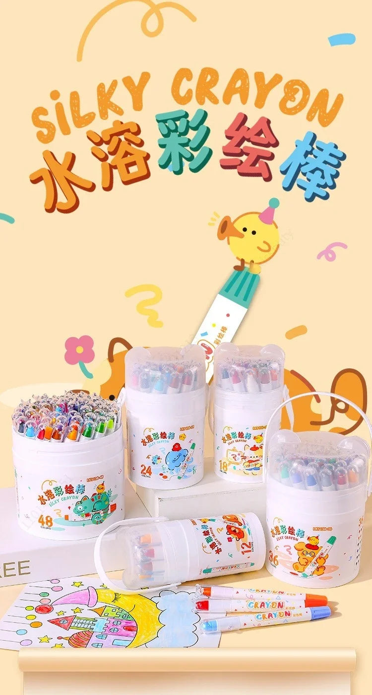 A set of silky crayon tubes and a plastic pencil is displayed on a wooden surface with colorful paper.