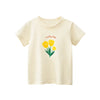 A cream-colored short-sleeve cotton t-shirt for girls featuring a yellow flower design and the text Lucky day!
