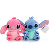 A cute plush figurine of a donkey character with pink and blue coloring.
