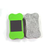 A bright green flexible magnetic dry erase board next to a gray felt-like board.