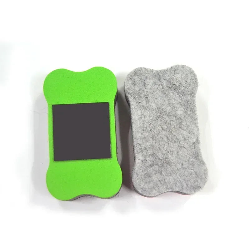 A bright green flexible magnetic dry erase board next to a gray felt-like board.