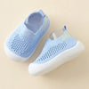 Light blue breathable mesh slip-on sneakers for toddlers with white soles