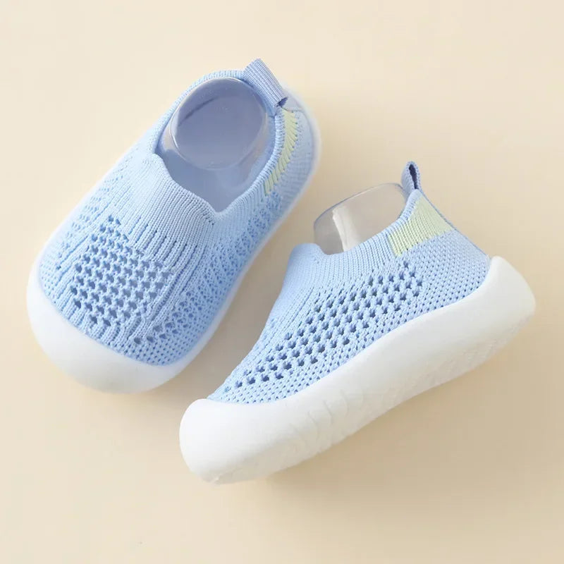Light blue breathable mesh slip-on sneakers for toddlers with white soles