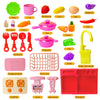 A collection of pink, green, and orange plastic kitchen tools, including a sink, cookware, cutting board, and various food it