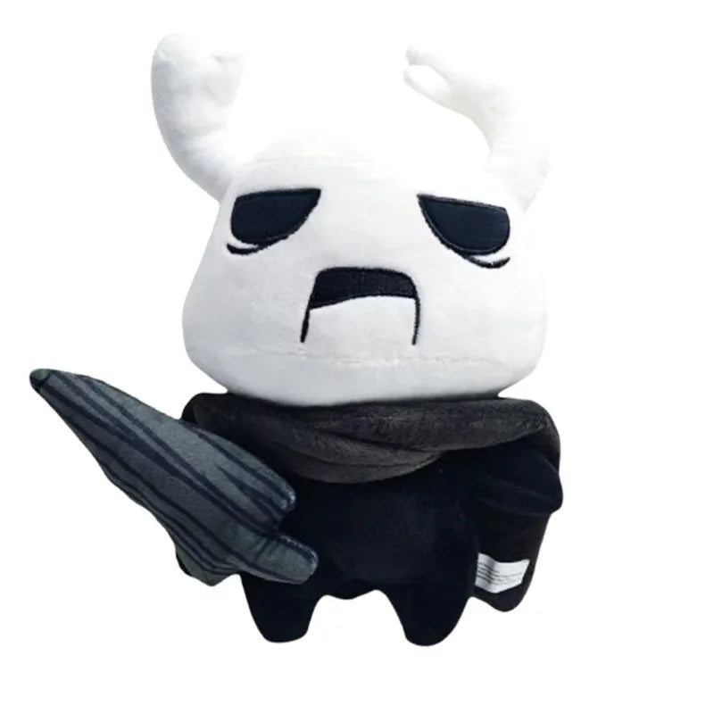 A plush doll resembling a character with white hair and dark features, holding a black fabric item.