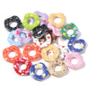 Assortment of colorful acrylic spacer beads in various pastel and bright colors