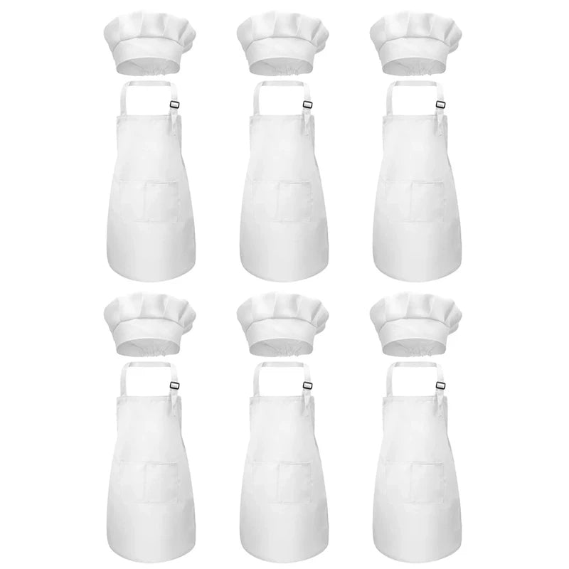 A set of white chef aprons and hats for kids