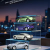A display of four high-fidelity model Mini 4WD remote control stunt cars in various colors and finishes.
