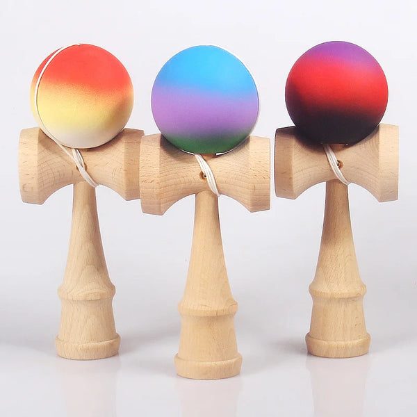 Three colorful graffiti painted wooden fitness balls mounted on wooden stands.